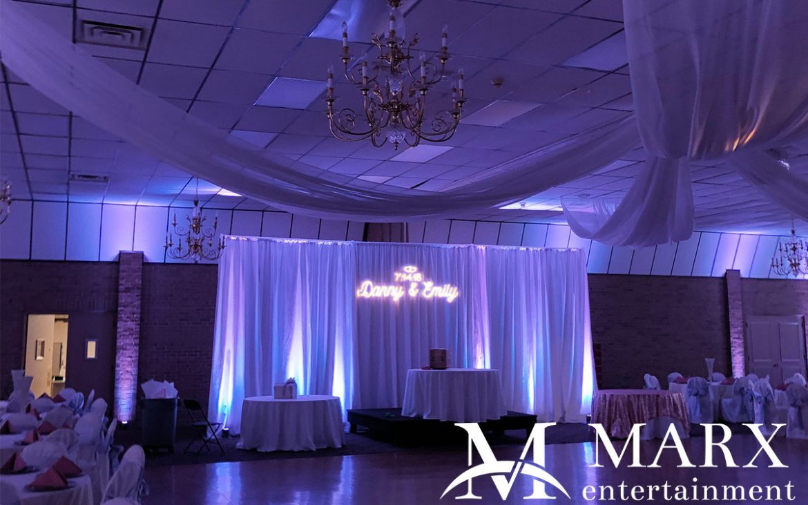 Pipe and drape with monogram lighting by MARX entertainment